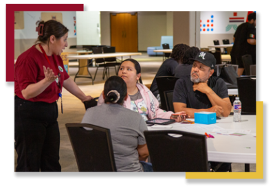 image-19 Claudia Rivas-Taylor speaks with families at a GEAR UP event.