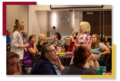 Mary-Beth Braggs speaks to a group of educators